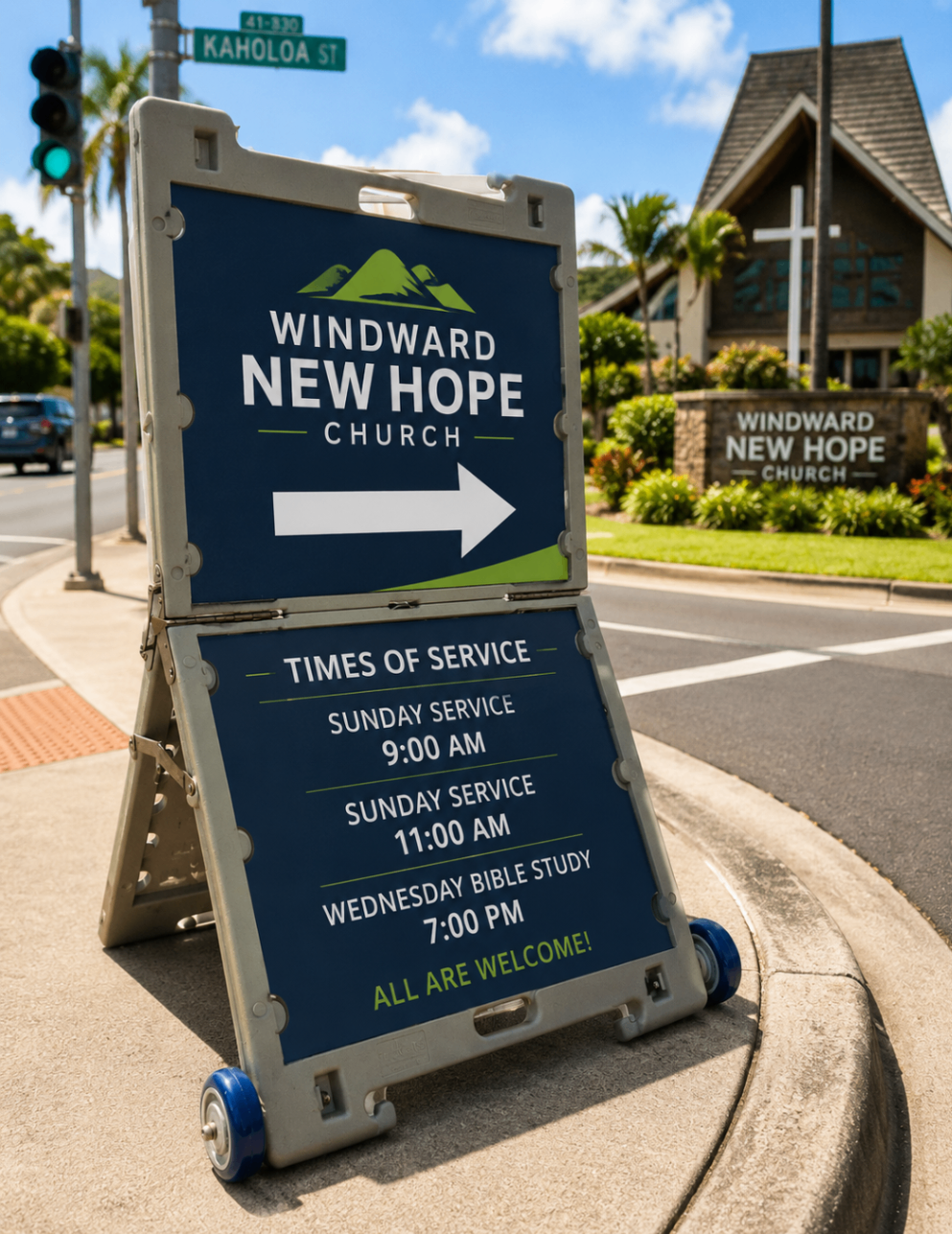 TrYfold church sign on a street corner near a church